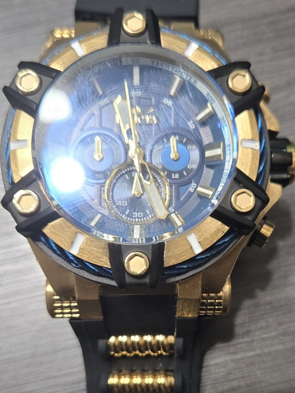 Invicta Gold and Black Men's Chronograph Watch with Blue Accents